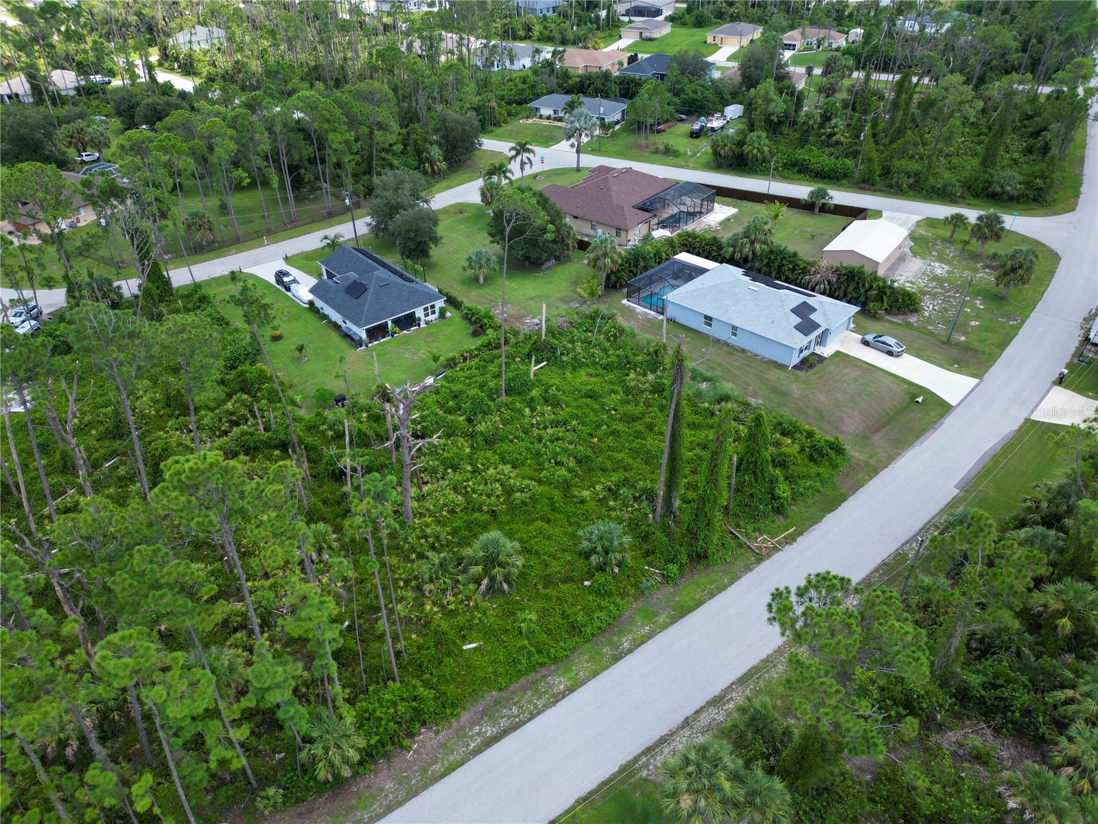 This vacant lot is tucked away in North Port, yet it’s just minutes from I-75, making trips to Sarasota, Venice, Port Charlotte, or even Naples quick and convenient. You’ll also be just a short drive from Wellen Park, a new community full of shops, dining, parks, walking trails, live entertainment, and the Atlanta Braves Spring Training stadium.The City of North Port continues to pop with new homes, schools, and businesses, which makes this the perfect time to secure your piece of land here in Sarasota County. With no HOA restrictions, you’ll enjoy the flexibility of designing your dream home, plus you’re close to Gulf beaches, golf courses, and beautiful nature preserves! Whether you’re dreaming of building your forever home or looking for a smart investment, this location checks all the boxes. And if you’d like assistance on the building process, our trusted custom home builder is available to walk you through every step and answer your questions!