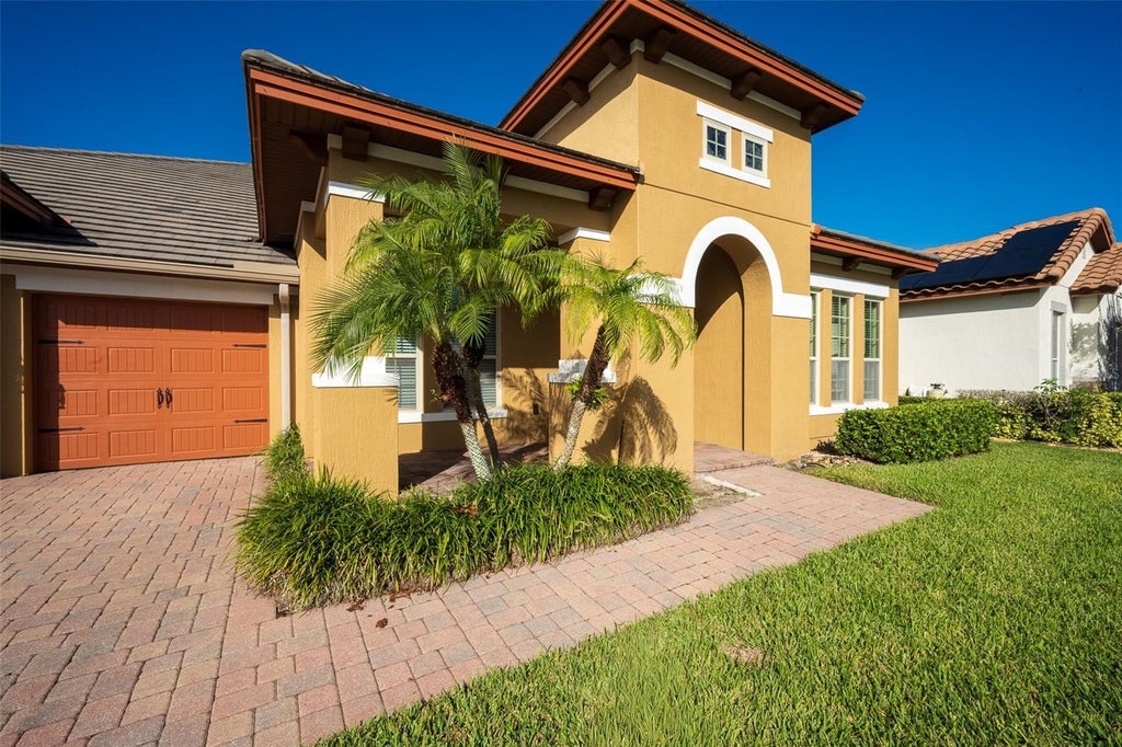 Photo of 7230 Sangalla Drive, Windermere, FL 34786 (MLS # O6453225)