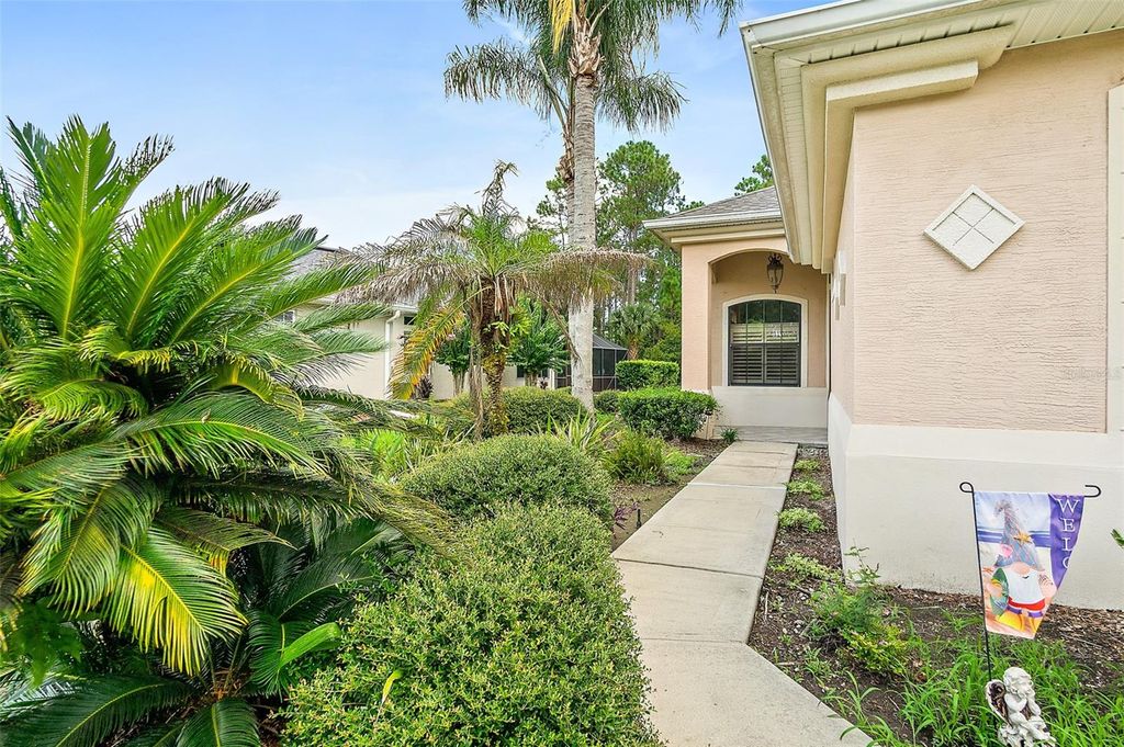 Photo of 110 S Hummingbird Place, Palm Coast, FL 32164 (MLS # FC320089)
