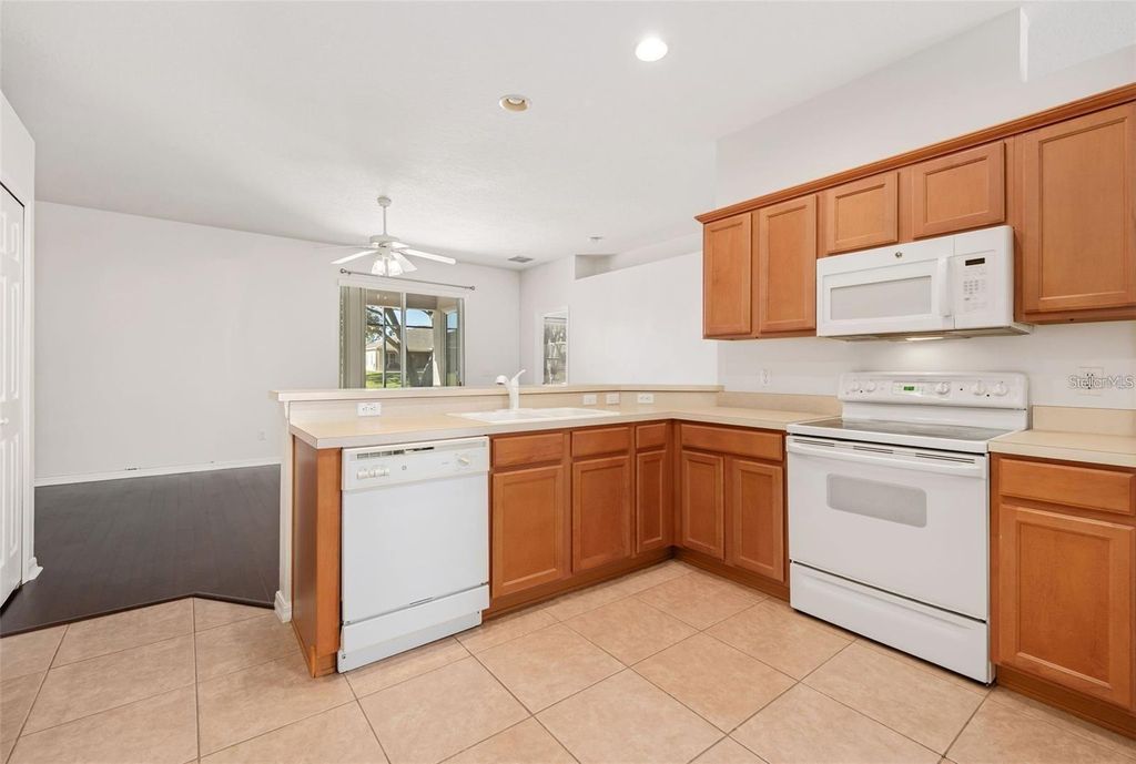 Photo of 9651 Old Marsh Court, Orlando, FL 32832 (MLS # R4911036)