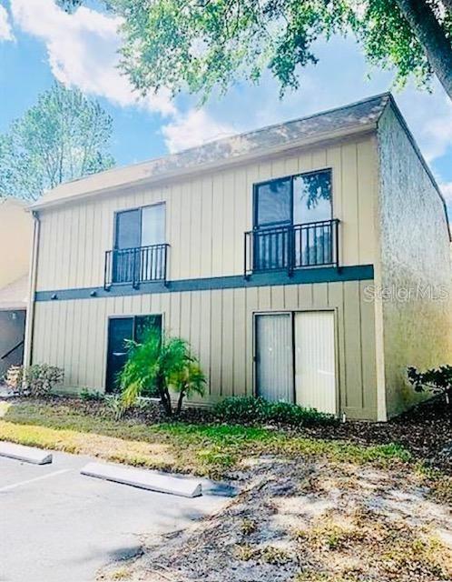Three bedroom/two bath home. Dining/living room combo with sliding glass doors that open to an enclosed screened balcony overlooking open green space in the community. Master bedroom has an En Suite. Community amenities included .