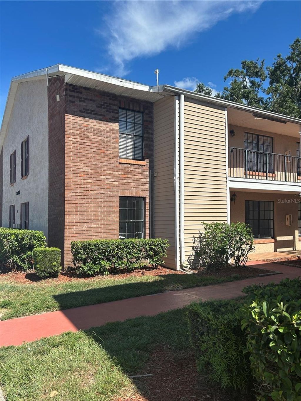 Photo of 21032 Voyager Boulevard #4, Land O Lakes, FL 34638 (MLS # TB8413721)