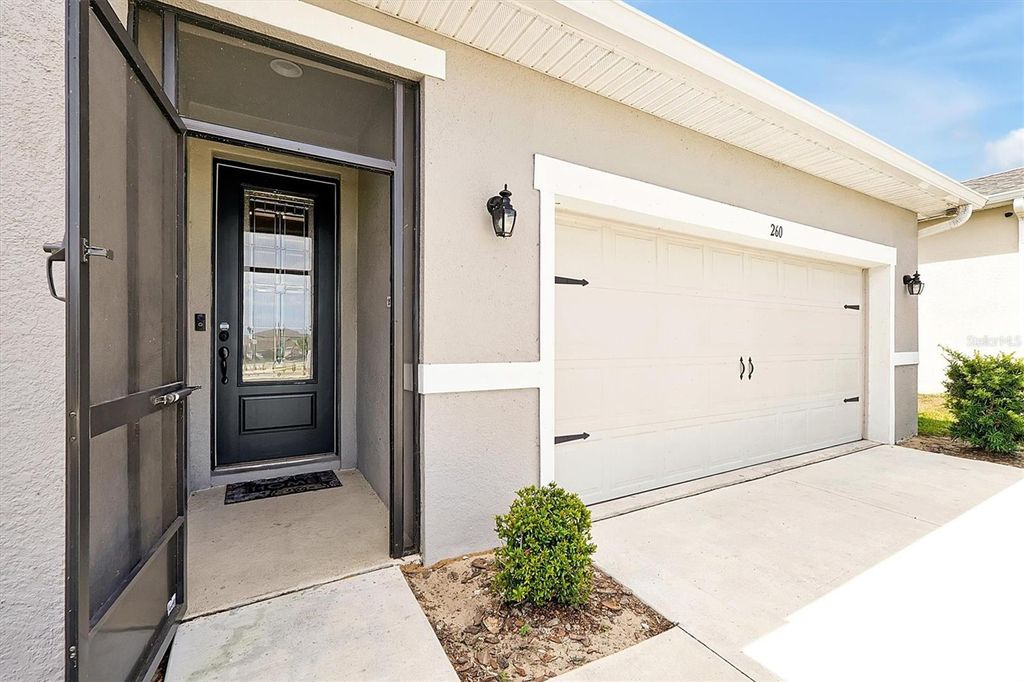 Photo of 260 Lake Smart Circle, Winter Haven, FL 33881 (MLS # O6301547)