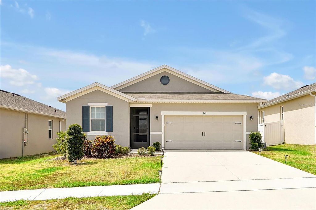Photo of 260 Lake Smart Circle, Winter Haven, FL 33881 (MLS # O6301547)