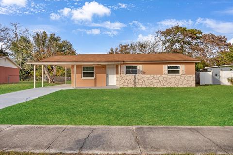 Photo of 8013 Rhea Circle, Orlando, FL 32807 (MLS # O6373437)