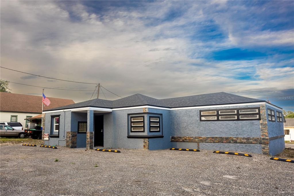 Photo of 115 N 10th Street, Haines City, FL 33844 (MLS # O6401011)