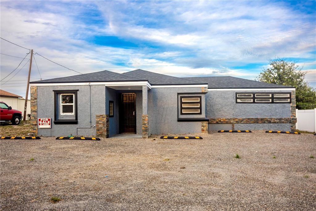 Photo of 115 N 10th Street, Haines City, FL 33844 (MLS # O6401011)