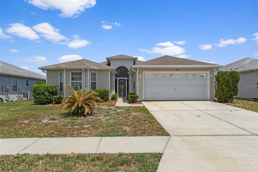 Situated on Golf Harbor Path in the Moorings, this 2 bedroom, 2 bathroom home offers just under 1,800 square feet of comfortable living space, along with a 2 car garage and a versatile bonus room that can easily serve as a third bedroom, home office, or hobby space. Inside, the open layout and volume ceilings create an airy, welcoming feel. The kitchen overlooks the main living area, making it easy to stay connected, and features beautiful granite countertops, ample cabinetry, and a cozy eat in dining space. The primary bedroom is well sized and includes a dual sink vanity, walk in shower, and sliding glass doors that lead directly out to the patio. The enclosed lanai extends your living space, with sliding vinyl windows that let you enjoy fresh air on cooler days or keep things comfortable when needed. Just beyond, the paver patio, added in 2019, offers a great setting for morning coffee or casual entertaining. A 2022 HVAC system adds peace of mind. Living in the Moorings means enjoying a low maintenance lifestyle with cable and WiFi, lawn care, trash and yard waste pickup, plus access to community amenities including a golf course, pool, boat launch with storage, shuffleboard courts, and well kept common areas. Conveniently located near downtown Inverness, the Withlacoochee State Trail, local lakes, medical facilities, shopping, dining, and I-75, this home is also right down the road of the recently renovated Zen Woods Golf Course. With its flexible layout, thoughtful updates, and convenient location, this home is ready for its next owner.