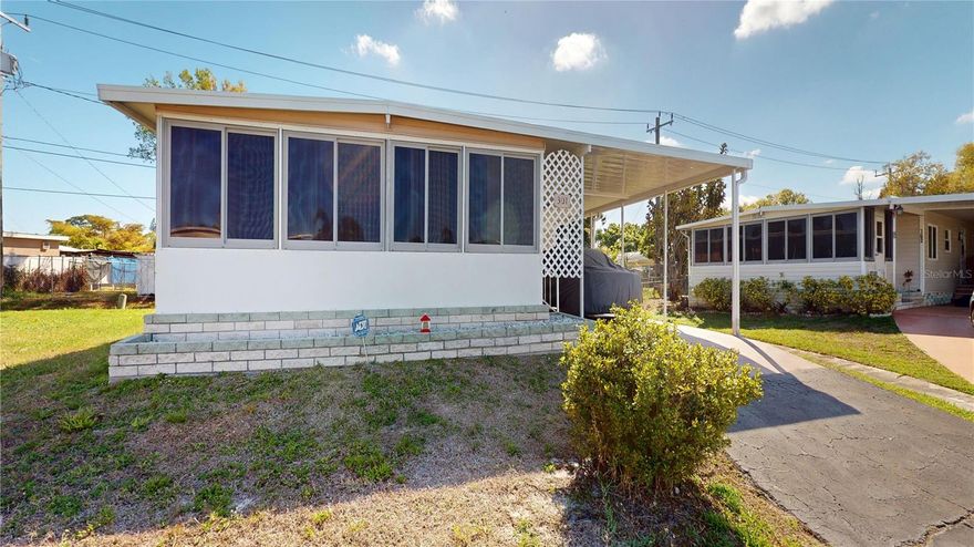 Looking for a winter retreat? Or simply year-round living with low fees? Look no further! 2 bedroom, 1.5 bath double-wide mobile home situated on a cul-de-sac in the PET SECTION of Chateau Village. Vested interest – Co-Op Certificate with unit (Ownership in your land). No Lot Rent and low maintenance fees is only $250 monthly and includes water, sewer, trash, lawn mowing, heated community pool, club house, shuffleboard court and manager. This Community also has a place you can store your boat or RV for a small fee. New HVAC Dec.2025. Roof and Florida Room 2016. Washer and Dryer in over-sized utility shed. Come enjoy the fully enclosed 10x21 Florida Room/Sun Room or the active life style of this well maintained 55+ community. Property being sold AS IS with right to inspect.