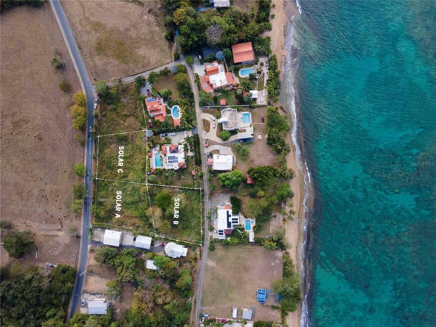 Lot A entrance is from road 413. Lot A is approximately 245 linear feet from Dogman's beach, and 433 linear meters via road 413 from Maria's beach.