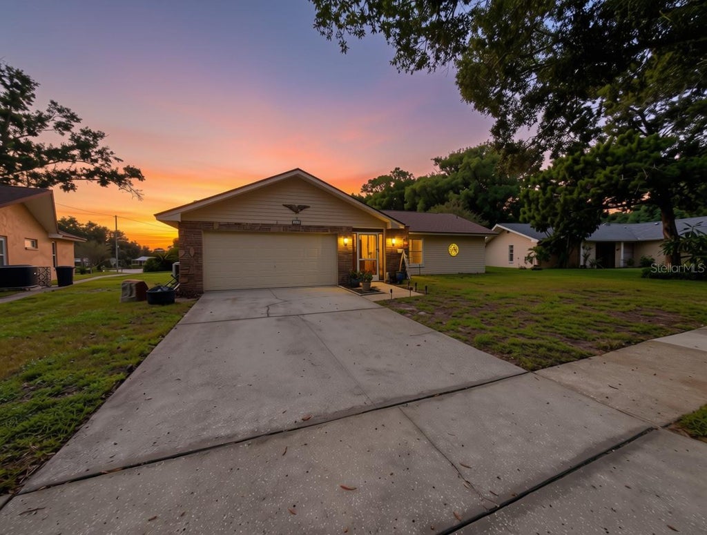 Photo of 1382 Glengarry Drive, Palm Harbor, FL 34684 (MLS # TB8551583)