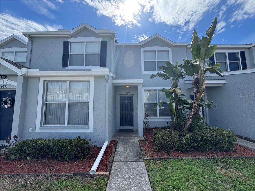 This large 2/2.5 Townhome in the gated community of Osprey Run is move-in ready. Features tile in kitchen, baths,  on main floor and carpet in bedrooms. Kitchen features solid wood cabinets. Backyard with a deck to relax and enjoy the Florida weather!: Community features include: Pool, dog park and great curb appeal. Located close to I-75, Crosstown, Mall, and Restaurants and much more. Community features: pool and playground. This one won't last long, make your appointment today for your private showings.
