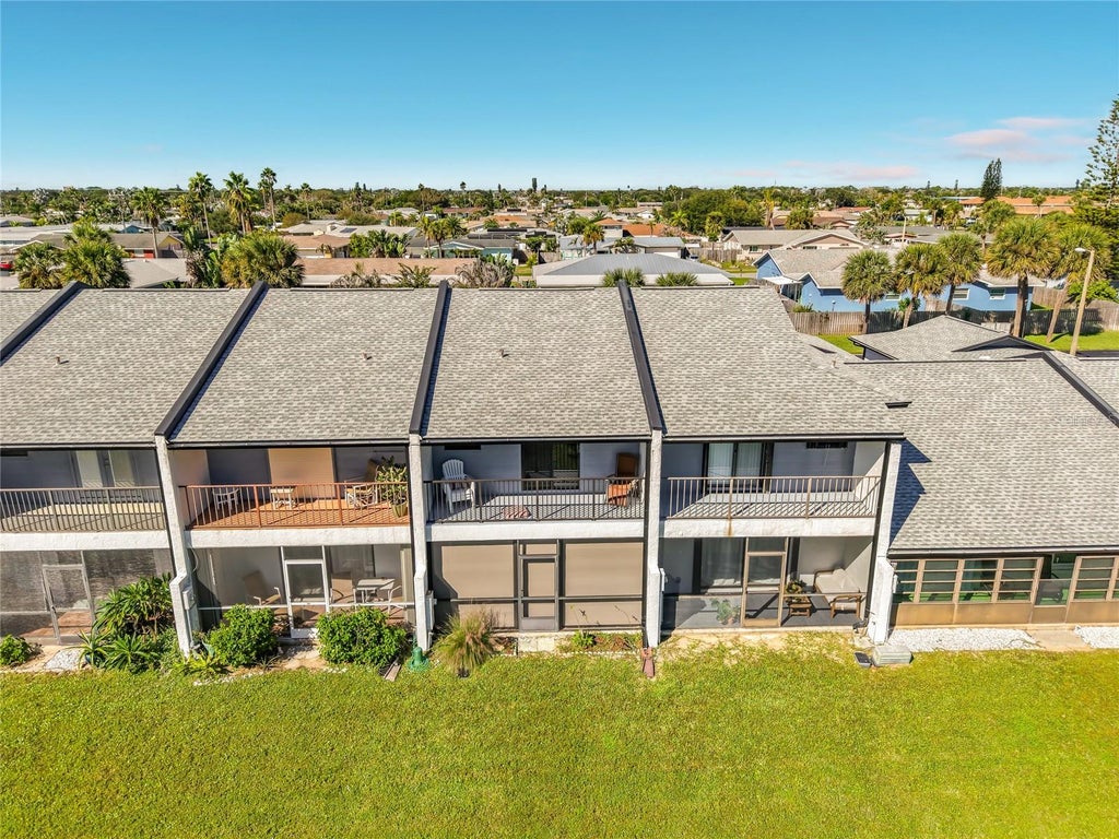 Photo of 721 Palm Springs Circle, Indian Harbor Beach, FL 32937 (MLS # TB8558887)