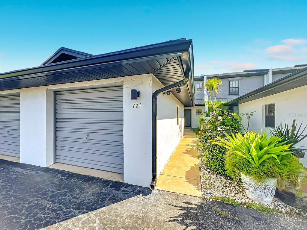 Photo of 721 Palm Springs Circle, Indian Harbor Beach, FL 32937 (MLS # TB8558887)