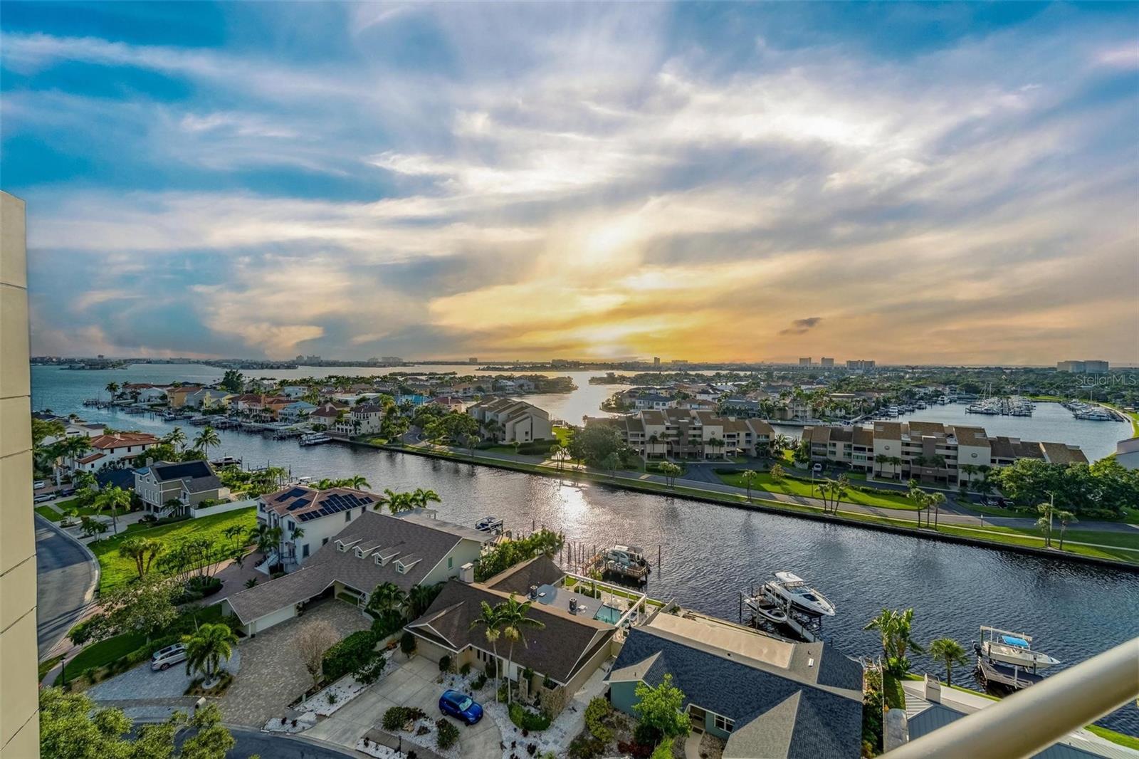 Welcome to 5950 Pelican Bay Plaza #PH-2D, a beautifully updated 2-bedroom, 2-bath penthouse condo in the coveted gated community of Pasadena Yacht & Country Club. Perched high above Boca Ciega Bay, this residence offers sweeping water and city views that stretch all the way to the Gulf of Mexico—the perfect backdrop for stunning sunsets and everyday relaxation.
Step inside to find a bright, spacious layout enhanced by floor-to-ceiling sliding doors and an additional balcony that floods the home with natural light while expanding your outdoor living space.
All of this comes with the convenience of being just minutes from Downtown St. Petersburg and some of Florida’s finest Gulf beaches. Life at Pelican Bay Condos is the perfect blend of comfort, convenience, and resort-style living.
