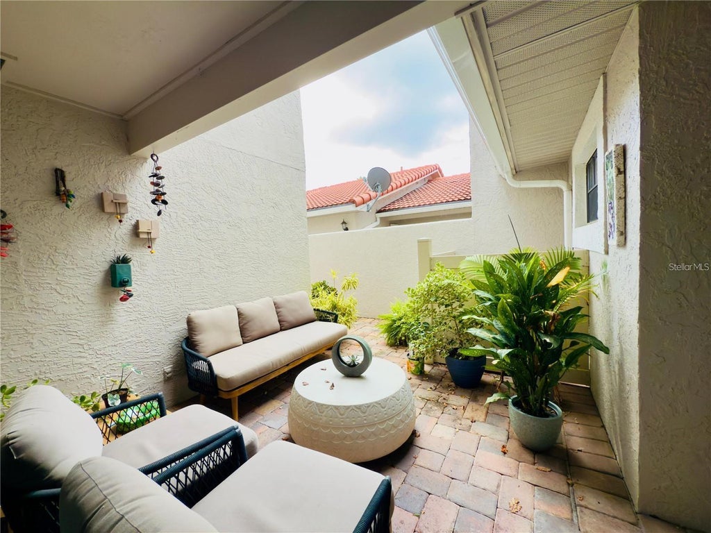 Photo of 8113 Breeze Cove Lane, Orlando, FL 32819 (MLS # O6438664)