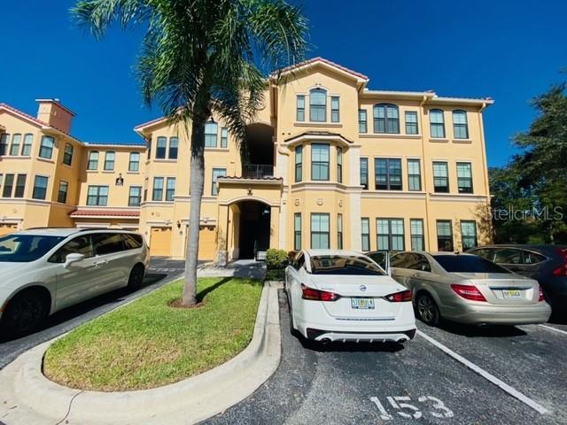 LOCATION, LOCATION, with a quick walk to the clubhouse & pool. The Grand Venezia is a beautiful waterfront, gated property with a 24/7 guard pavilion. This 3rd floor, one bedroom unit features a patio with partial views of Tampa Bay. The living & dining room has neutral ceramic tile with a gas fireplace in the living area. Granite counter tops throughout kitchen with breakfast bar & large pantry. The master bath and guest bath have a luxurious Roman Tub with shower. The spacious Master bedroom features a large walk-in closet. Additional features include crown molding in the living, dining, foyer and master bedroom with 9' ceilings throughout. The Grand Venezia has resort style amenities which include geo-thermal heated pool/spa, sauna, lighted tennis courts, playground & free car wash area. Enjoy walking your pet on the 1.5 mile lighted water front promenade. The updated fitness center is open 24/7 featuring cardio and strength training equipment. Gas grills and picnic tables behind every building. The Grand Venezia has completed a renovation project which includes new tile roofs, new stucco/wood, new hurricane-double pane windows, paint & lush landscaping. PET FRIENDLY! Resort style living!