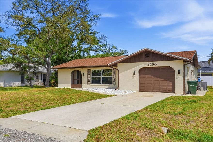 Welcome to this beautifully updated South Venice home offering 2 bedrooms, 2 baths, a 1-car garage, and an oversized 20'x8' Florida Room that provides incredible flexibility. Whether you need a home office, exercise room, hobby space, additional living area, playroom, card room, or the perfect spot for Mahjong with friends, this bonus space can easily adapt to your lifestyle. Recent improvements provide peace of mind and modern comfort, including a new roof in 2025, two newly tiled walk-in showers, new vanities, a new AC system and ductwork, new interior paint, and a new leach field installed in 2021. Split bedroom plan allows for privacy for family or guests. Primary suite has a large walk-in closet with built in storage. With a spacious, fenced yard, there is room for pool, for pets to roam, and plenty of space for entertainment.  One of the unique perks of living in South Venice is an optional access to the South Venice Beach Ferry. For just $200 annually, residents can enjoy a quick ferry ride to a private beach on the Gulf, offering a true slice of paradise! Ideally located just minutes from the charming boutiques, dining, and cultural attractions of Downtown Venice, as well as the beautiful shores of Venice Beach, this home combines thoughtful updates, flexible living space, and an exceptional Florida lifestyle.
