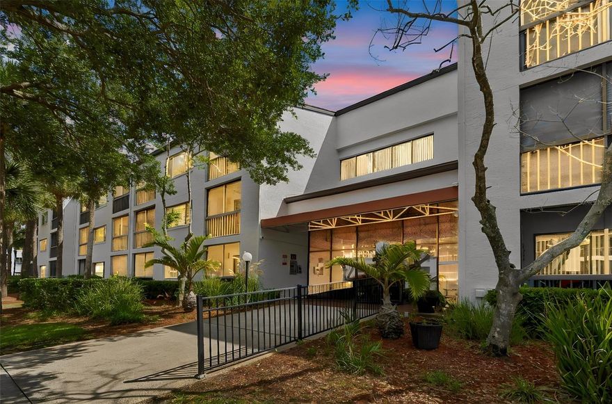 One or more photo(s) has been virtually staged. Experience easy Florida living in one of Clearwater’s most desirable active adult communities, perfectly tucked away in the heart of Countryside near shopping, dining, beaches, and the Pinellas Trail! This beautifully maintained 2-bedroom, 2-bath condo offers 1,105 sq ft of comfortable living space with a spacious living and dining room combo, soaring ceilings, and an inviting open layout.

The updated kitchen features stainless steel appliances, abundant cabinetry, bar seating, and additional space for a cozy bistro dining area. The split-bedroom floor plan provides privacy, while the primary suite features a walk-in closet and private balcony access. Enjoy the added bonus of dual balconies with sliding screen windows, creating the perfect space to relax and enjoy the Florida lifestyle year-round. The primary bedroom balcony also includes a private in-unit storage room for added convenience. In-unit laundry adds everyday ease.

Ideally located in the closest building to the resort-style pool and clubhouse, this unit also includes the covered carport space nearest to the building entrance. Residents enjoy a vibrant active-adult lifestyle with amenities including a large heated pool, tennis courts, clubhouse events, pool tables, ping pong, and nearby access to the Pinellas Trail. Secure telephone entry access to the building provides additional peace of mind.

A rare bonus — the community allows residents under 55 to occupy the home as long as one resident is 55+, offering added flexibility for seasonal residents, snowbirds, or multi-generational living.

Additional highlights include:
• Low monthly condo fee including cable, internet, water, trash, and more
• NON Flood Zone – No flood insurance required
• 2020 HVAC
• Newer building roof
• Covered parking

Unbeatable location just minutes to Honeymoon Island Beach, Downtown Dunedin, Countryside Mall, Whole Foods, Fresh Market, Publix, TJ Maxx shopping center, restaurants, and more. This is the perfect blend of convenience, coastal lifestyle, and active community living!