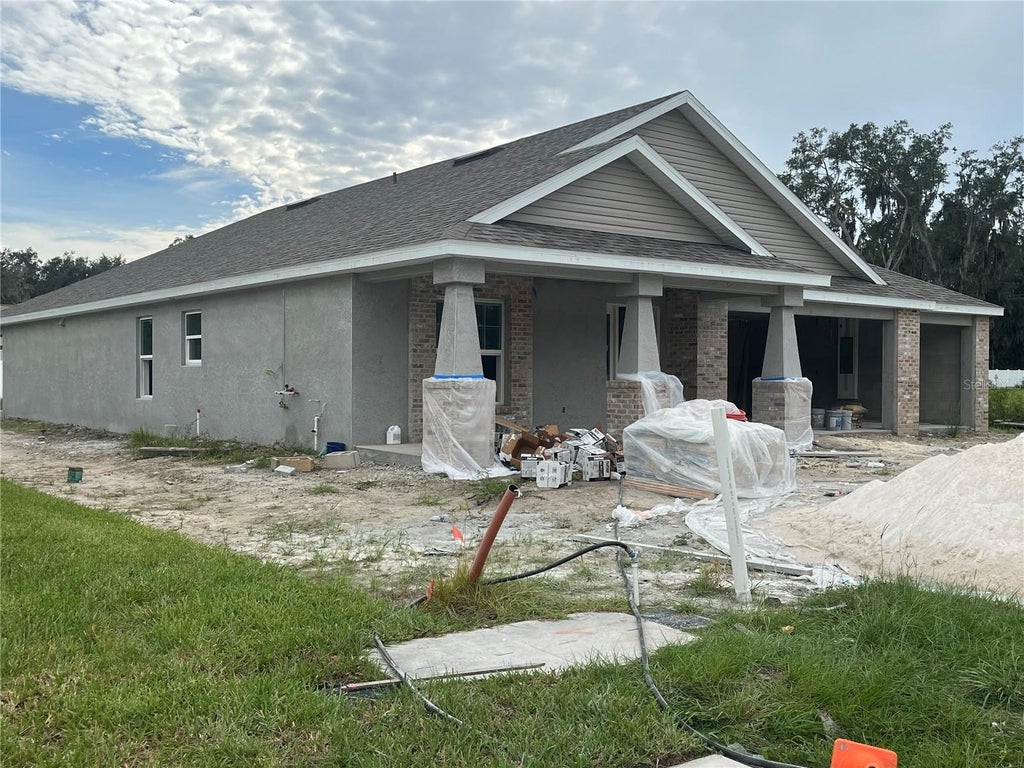 Photo of 409 Shannon Estates Court, Plant City, FL 33563 (MLS # TB8552243)
