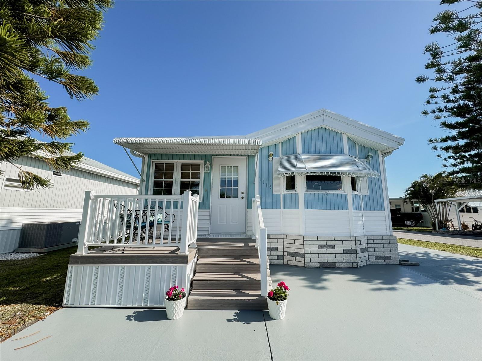 This manufactured home is the essence of Florida retirement. It's fully furnished and turnkey ready to go. Nestled in the 55+ community of Sugar Creek Country Club, this 1 bedroom 2 full bath is the place to call your forever home. Sitting on a corner lot, it boasts spacious outdoor areas and a larger driveway for parking. Featuring an open floor plan and kitchen layout, it is perfect for hosting family or friends. This friendly community has amazing amenities such as a shuffleboard court, club house, pool, and a wood working shop. This is most definitely a must see! *This property had NO hurricane flooding!*