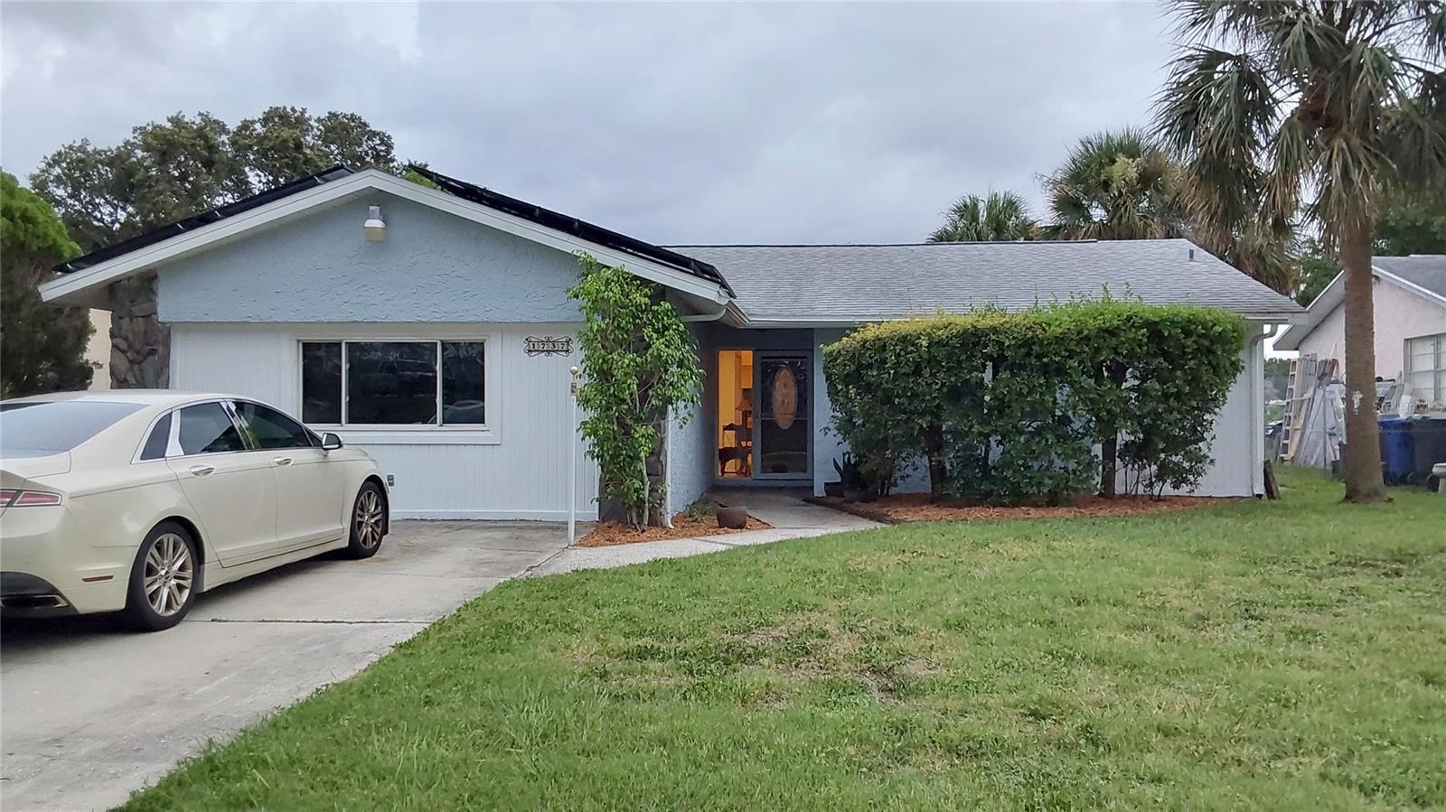 Lakefront home in Dunedin. Enjoy watching ospreys and otter fish, ducks swim and view many different Florida birds from your backyard. This gorgeous 4 bedroom/2 bath home has had some recent updates. New luxury vinyl waterproof flooring throughout, newer stainless steel appliances , new granite countertop, 6 new windows, new sliding glass door, new ceiling fans, new vanities, new mini split A/C and new patio. Freshly painted inside and out. Open floorplan with great views to lake. And...comes with SOLAR PANELS for all your electric needs. Pay only $40 a month for electric!! Easy access to major roads, shopping, parks, Honeymoon Island and minutes to downtown Dunedin with year-round activities. Showing by appointment only.