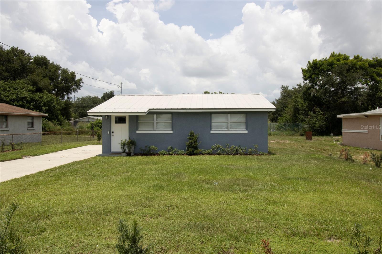 Welcome to this charming 2-bedroom, 1-bathroom home nestled in the quiet community of Waverly, just outside of Lake Wales. Recently updated, this home features a brand-new metal roof and a new HVAC system with updated ductwork installed in 2023, ensuring energy efficiency and comfort year-round. Inside, you'll find beautiful luxury vinyl plank flooring throughout, offering a sleek and modern look with low maintenance. The kitchen has been tastefully renovated with crisp shaker-style cabinets, granite countertops. This home sits on a spacious lot, providing plenty of outdoor space for gardening, entertaining, or relaxing. Whether you're a first-time buyer, downsizing, or looking for a great investment opportunity, this move-in-ready property offers incredible value. Don’t miss your chance to make it yours!