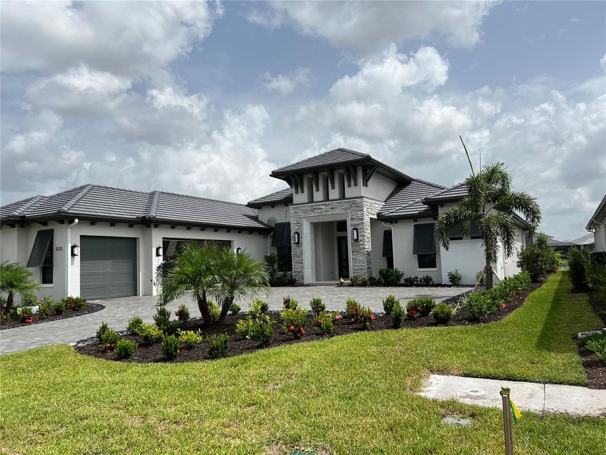 New construction. Arthur Rutenberg Homes Talise model on a lake homesite,