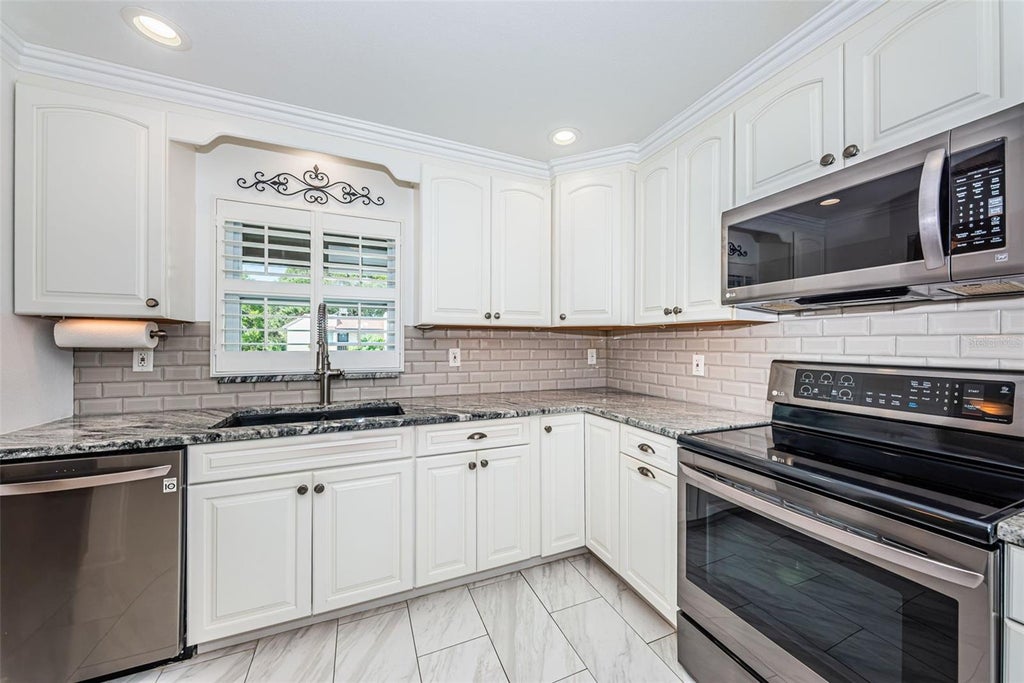 Photo of 1100 E Bay Drive #68, Largo, FL 33770 (MLS # TB8553461)