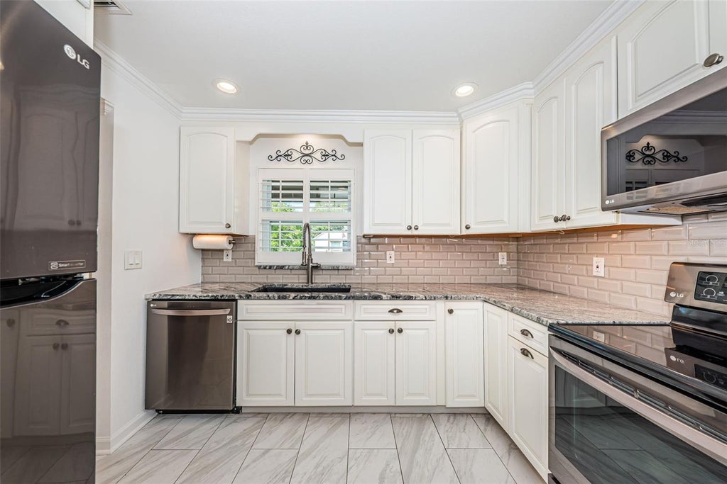 Photo of 1100 E Bay Drive #68, Largo, FL 33770 (MLS # TB8553461)
