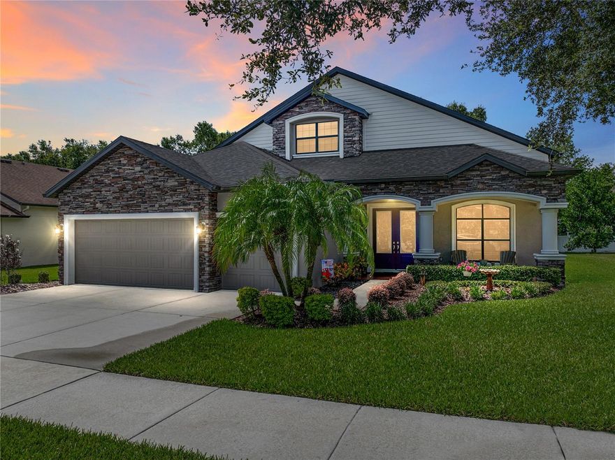 Absolutely stunning 4BR/4BA home nestled in the established community of Starling Ridge. Upon entry, you find travertine and wood-look laminate throughout the entire home (with only carpet on the stairs) and crown molding in the common areas on the lower level. To your immediate left is the formal Dining Room perfect for those holiday gatherings and entertaining guests. To the right are glass french doors leading you into the office where you will find ample lighting as well as a spacious area for creativity and productivity. Moving into the home, you will find yourself in the open concept Great Room perfect for game nights with friends and family. The Great Room flows into the Kitchen and features sliders to the lanai. The Kitchen has so many features including a large eat-in area, stone counters, a 4 appliance GE suite in stainless steel with double oven, breakfast bar, lots of cabinetry and counter space. As you look around the Kitchen you will envision whipping up weekend breakfasts or even family dinners where everyone gathers to connect. Also on the first level is secondary bedroom and full bathroom, nice for visitors or a multi-generational arrangement. Off the Great Room is the conveniently located Primary Bedroom boasting an En suite bathroom with a dual sink vanity, good-sized walk-in shower, and large walk-in closet. Moving up the stairs you find the Bonus Room with extra storage space and a reading nook, additional full bathroom, 2 additional bedrooms, both with walk-in closets, and connected with a full jack and jill bathroom. Enjoy your weekends out on the screened lanai or back patio that includes a built-in bench and fire pit. A great place for morning coffee or weekend get-togethers! Schedule your showing today.