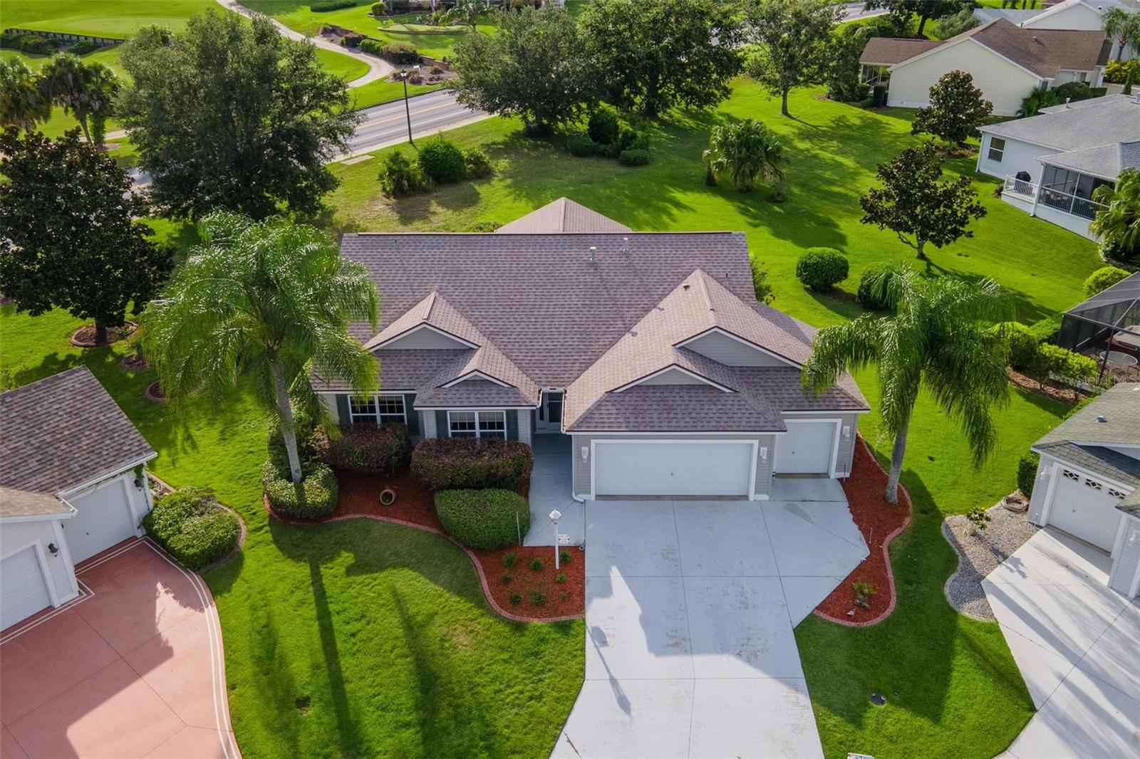 AMAZING home in highly desirable VILLAGE OF AMELIA centrally located between "The 6's" RTE 466 and RTE 466A. Lake Sumter Landing Town Square just a few minutes to the north, and Colony Plaza Shopping Center to the South! Brownwood Paddock Square and Spanish Springs Square are also available via golf cart access making this a very desirable location. Fabulous 3/2 Designer home PLUS DEN/OFFICE with 2 car garage PLUS golf cart garage. NEW ROOF in 2023! Oversized elevated lot on cul-de-sac with golf & water views from back porch and no homes directly behind property. Many AMENITIES AND RETAIL CENTERS just minutes away from property and many are golf cart accessible including multiple executive and championship golf courses and Country Clubs, neighborhood recreation centers all with pools, dog parks, walking trails, Colony Retail Plaza, Publix supermarket, Walgreens, Walmart Food market, Dunkin, Lowes Trailwinds retail plaza, Publix, Aldi’s, Starbucks, Pinellas Retail plaza, Winn Dixie, Banks, Villages Public Library, & much more!