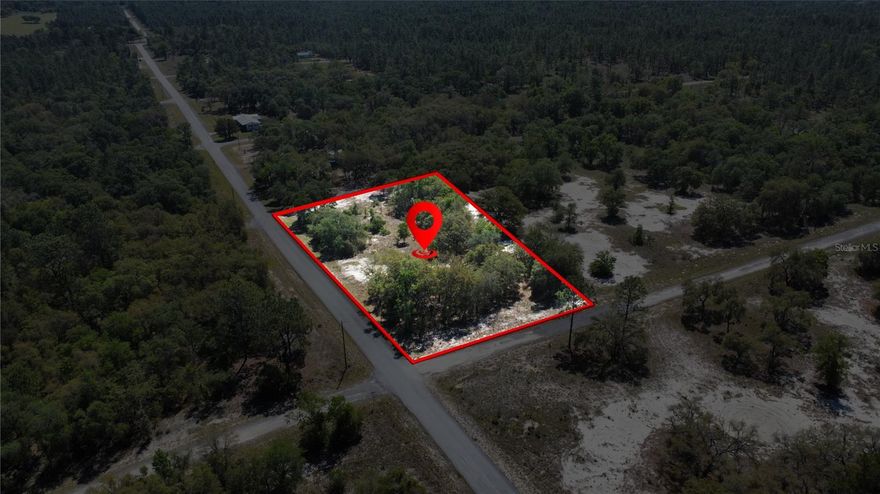 Discover the Perfect Spot for Your Dream Home! This exceptional 1-acre corner lot in the highly sought-after Rainbow Lakes Estates of Dunnellon is the opportunity you’ve been waiting for. Featuring a lightly wooded setting with the added benefit of no HOA restrictions, this property offers both privacy and charm.

Picture yourself building your ideal retreat on a smoothly paved street, with easy access to the electrical grid already nearby. Ideal for nature lovers, the lot is just minutes from the scenic Rainbow River and the adventurous Withlacoochee Trail. Plus, the renowned Rainbow Springs State Park borders the property, providing unparalleled natural beauty right at your doorstep.

Enjoy the tranquility of a natural setting without sacrificing modern conveniences. The vibrant shopping, dining, and entertainment options in downtown Dunnellon and Ocala are also close by, making this lot the perfect base for a life full of adventure and comfort.

Don’t miss out on this chance to create your own sanctuary in a place where every day feels like an endless vacation in Florida!