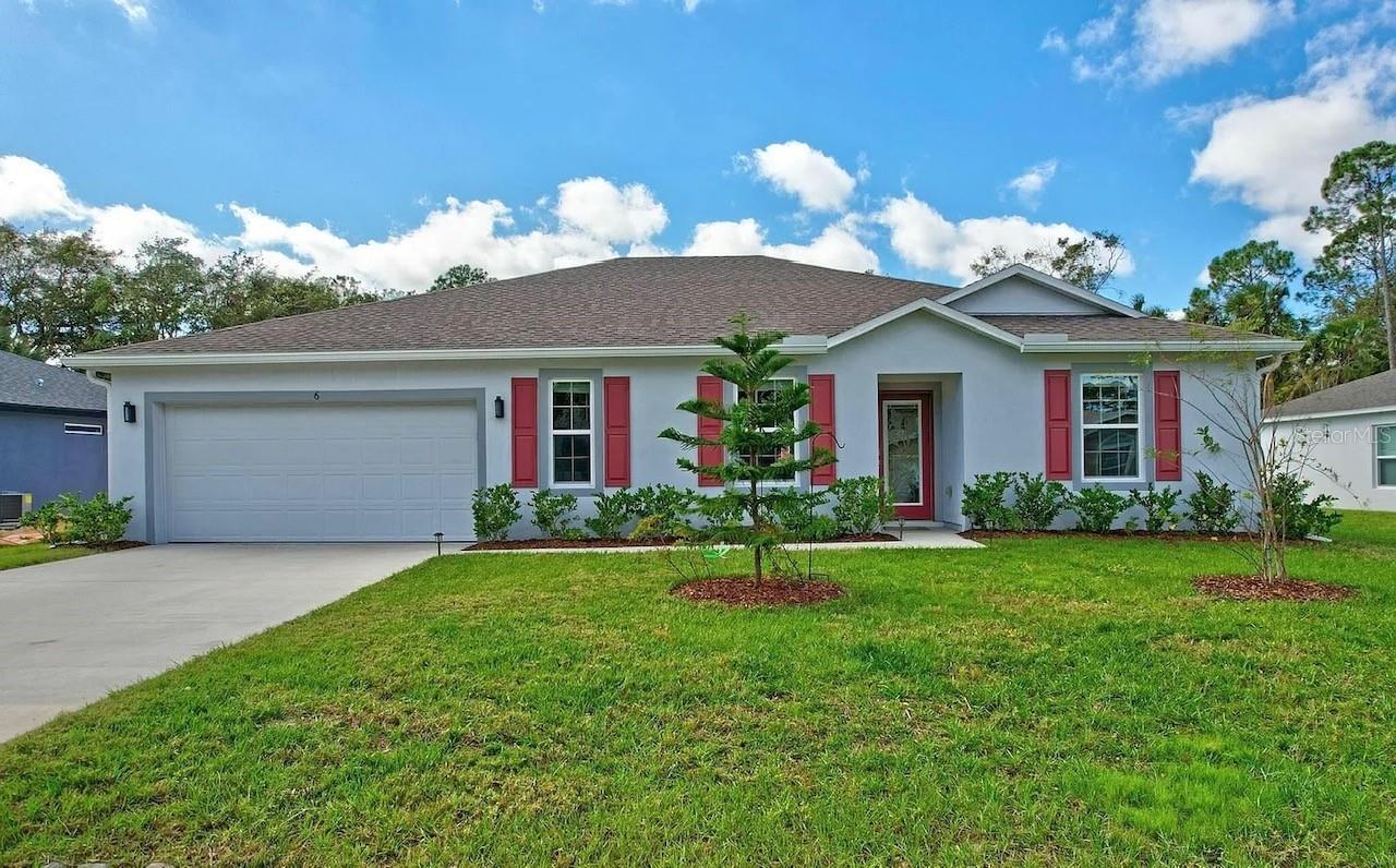 Don't miss out on this better than new construction, luxury 4-bedroom, 2-bathroom home featuring a magnificent heated in-ground salt water pool with a heated spa! This spacious home delivers over 3,800 sq ft of quality indoor and outdoor living space that offers many fantastic upgrades. The well designed kitchen features granite countertops, stainless steel appliances, a walk-in pantry, and a kitchen island. The bathrooms have natural stone countertops along with floor-to-ceiling tiled showers. Enjoy your spectacular completely fenced private backyard with inground saltwater pool and spa. Additionally there is a bonus room that has french doors that can be used as a den or home office. The most expensive and cost saving feature found in this home is the totally owned Solar Photovoltaic system that significantly reduce the utility bills. More features include an indoor laundry room and a water softener system. This conveniently located home is close to everything with quick access to schools, parks, shopping, restaurants, and major highways and is just a short drive to St. Augustine or Daytona Beach! Schedule your private showing today!