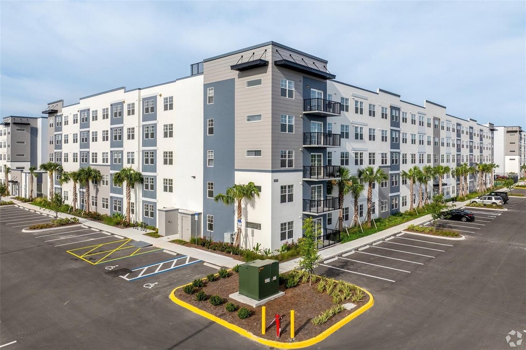 Photo of 5579 Millenia Park Blvd #415, Orlando, FL 32839 (MLS # O6444992)