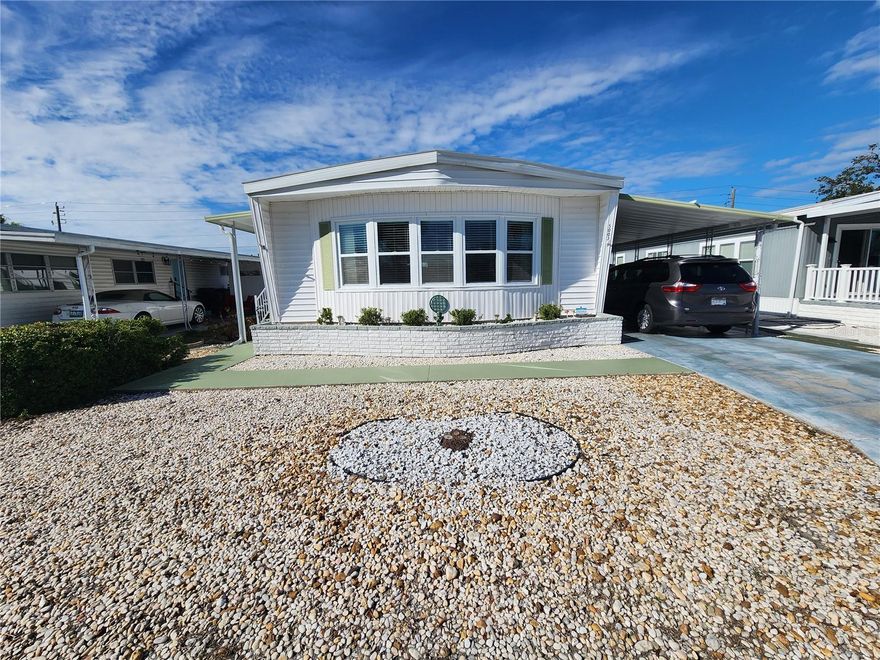 Well-maintained and move-in ready home located in the desirable 55+ community of Heather Hills. Just bring your clothes—this home is being sold turnkey furnished! Recent upgrades include new windows and blinds, brand-new roof (2025), updated breaker panel, newer appliances, and updated flooring throughout. The open, light, and bright floor plan features a breakfast bar, spacious living areas, and an inviting layout perfect for relaxing or entertaining.  The primary suite offers an updated shower and a walk-through closet leading to a convenient laundry/office area. Enjoy peace of mind with a termite contract in place and the ease of no yard work. Heather Hills offers an active clubhouse, shuffleboard, and a friendly, social atmosphere. Pets are welcome!  Best of all—NO lot rent and low maintenance fees. Ideally located near grocery stores, restaurants, banks, Sarasota–Bradenton International Airport, and just minutes from the beautiful beaches of Anna Maria Island. Whether you’re looking for a winter retreat or a full-time residence, this home is the perfect fit.