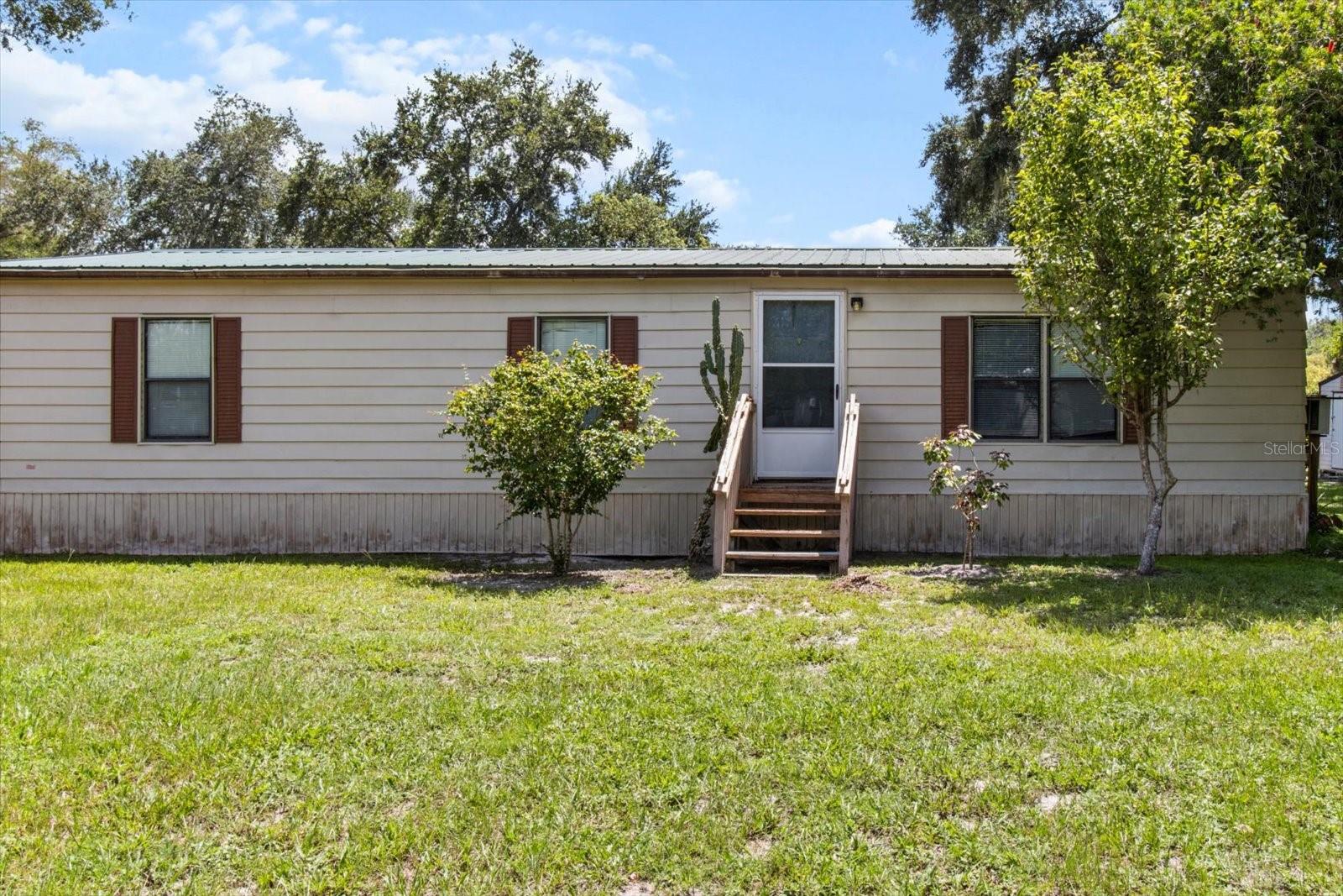 Discover your slice of paradise! This charming 2-bedroom, 2-bathroom home in Floral City is ideally situated for those seeking both privacy and adventure. Nestled down a picturesque, winding road on a quiet cul-de-sac, you'll find true tranquility. Best of all, your backyard opens onto a canal with access to the expansive Lake Tsala Apopka, offering endless opportunities for boating, fishing, and exploring. Embrace a lifestyle of peace and natural beauty!