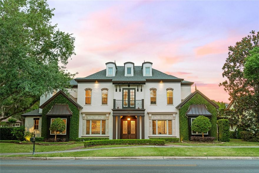 **This stunning estate just became an unbeatable opportunity--luxury living at a dramatically reduced price! Don't miss your chance to own this exceptional home in the highly coveted Windsong community with access to the gorgeous Winter Park chain of lakes. Prepare to be impressed as you enter this almost 6,000 square foot home adorned with custom high-end features throughout, plus a fabulous guest apartment with a full bathroom and kitchenette fully renovated to be enjoyed as a private poker/bourbon room. This exceptional residence has been converted to a full Smart Home with integrated controls for lighting, audio/video, security system with cameras, intercom, thermostat and sun shade. The beautiful chef's kitchen boasts a brand new 48” Sub-Zero refrigerator, and all new Wolf appliances including double 30” electric ovens, microwave, gas cooktop, hood insert, and warming drawer. For added convenience, a fully appointed Butler's pantry is adjacent to the kitchen. Retreat to the stunning first floor owner's suite featuring a newly installed electric fireplace, sitting area, a walk-in closet with custom cabinetry, a separate office/home gym and a spa-inspired bathroom with a jetted tub and steam shower. Just outside, step into your own personal wellness retreat with a new Polar Monkey brand cold plunge and a four-person sauna. Also, guests will enjoy the convenience of another private first floor bedroom suite. Upstairs are the additional three spacious bedrooms and bathrooms, a huge loft area, and hidden stairs leading to a generous air conditioned storage room, great for a home theater. The outside oasis greets you with a fully reimagined expansive covered lanai with an outdoor kitchen complete with a 60" Fire Magic grill, 60" Fire Magic vent hood, Summit refrigerator, and stainless steel cabinets. Relax by the sparkling saltwater pool with its sun shelf, retractable screen, and travertine deck surrounded by lush tropical landscaping and artificial turf for carefree living. The extensive renovations to this luxury estate continue with the installation of a new roof, new gutters with leaf guards, freshly painted exterior, new wood trellis, all new saltwater pool equipment, and epoxy garage flooring with added custom cabinets. Embrace this luxury lifestyle with exclusive access to the Windsong Residence Club overlooking the Winter Park Chain of Lakes, with amenities including lake access, community pools, splash park, playground, and use of the pontoon boat. This home may be purchased fully furnished. Don't miss the opportunity to own this spectacular home in one of Winter Park's most sought after neighborhoods with its top-rated schools, and proximity to shopping and dining on Park Avenue in picturesque downtown Winter Park!