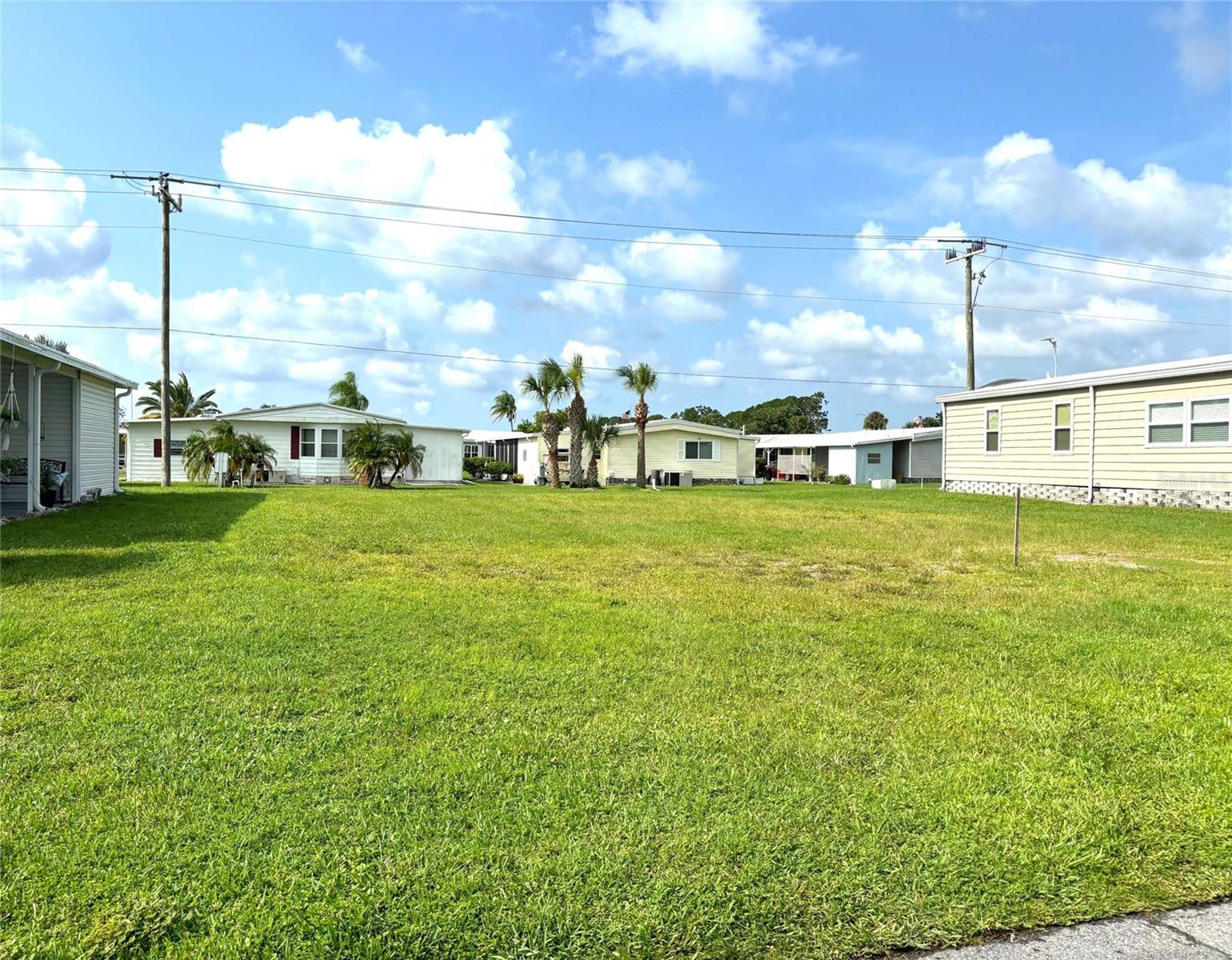 Vacant lot in a vibrant 55+ community! La Casa offers the ultimate Florida lifestyle. We have 974 homes nestled among a variety of native trees with spacious common grounds surrounding our eight lakes. Located between Sarasota and Fort Myers, this is a boater's dream with access to the Gulf of Mexico. It is convenient for shopping, sightseeing, golfing, fishing, and boating, as well as all the culture and elegance the Southwest Florida area is noted for. La Casa may have the best pools in the area. Our crown jewel is an extremely large, 40 X 60-foot swimming pool that is kept at a perfect 87 degrees. Our smaller 20 x 40 pool is quietly nestled between the clubhouse and the Activity Building. Both pools have adjacent hot tubs which are ideal for soaking muscles that are tired from golfing or tennis. Wireless Internet (Wi-Fi) is available at the Clubhouse, Activity Building, and Recreation Hall area where these pools & spas are located, so you can catch some rays while you catch up on your email! Sound enticing? Come for a visit to this self-contained oasis and see for yourself why La Casa is the ultimate destination for both snowbirds and year-round residents!