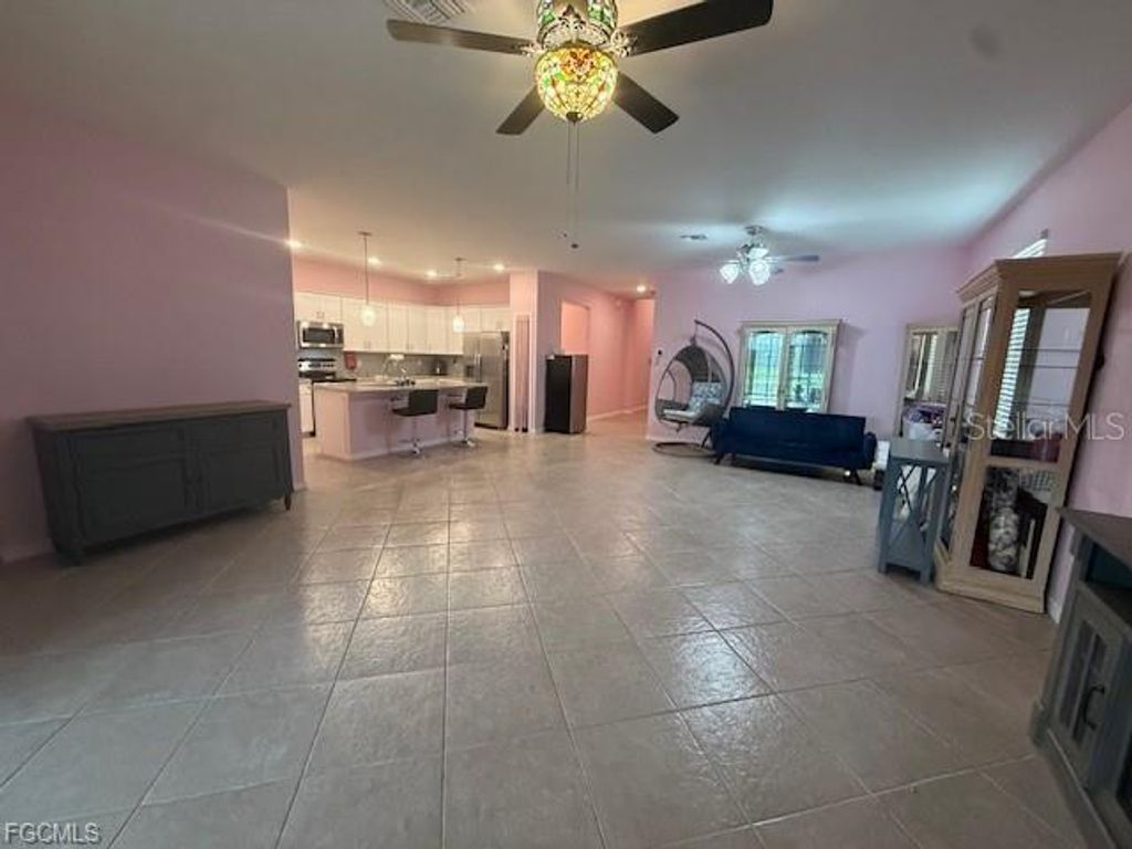 Photo of 1881 W Isles Road, Port Charlotte, FL 33953 (MLS # A4667872)