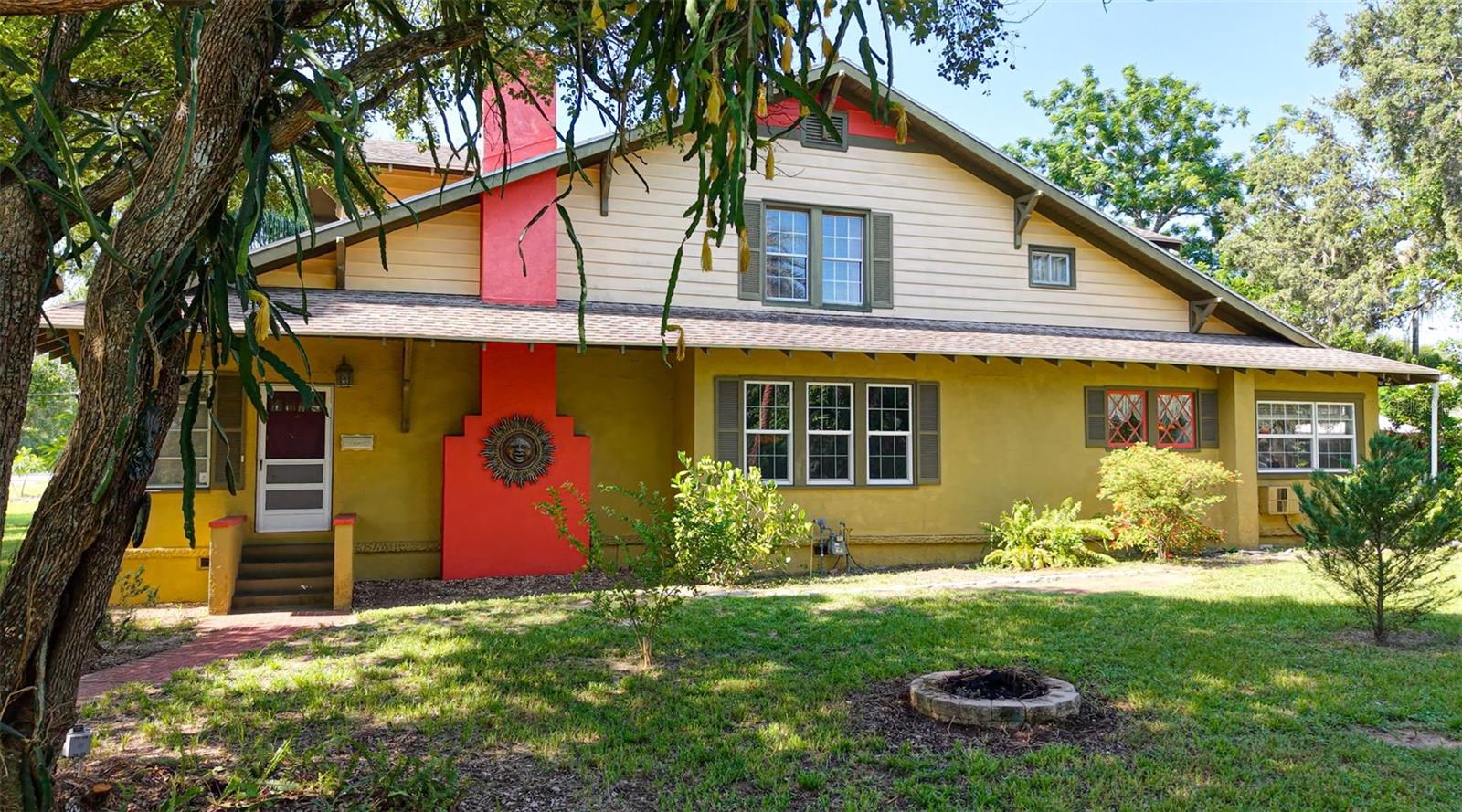 Charming 1925 Historic Craftsman Home in the Heart of Eustis!
Welcome to 150 E Charlotte Avenue, a beautifully preserved 5-bedroom, 2-bathroom Craftsman-style home that seamlessly blends thoughtful updates with the timeless charm of its vintage roots. Built in 1925, this home proudly stands as a piece of Eustis history, showcasing the character and craftsmanship of a bygone era.
Step inside to spacious living areas filled with rich architectural details, and a warm, inviting atmosphere. Recent updates include repiped plumbing (2015), a new roof (2010), and updated Pella energy efficient windows (2017)—offering modern peace of mind while preserving the home's historical integrity and features. This home offers 5 bedrooms with options for your primary either on the 1st or 2nd floor. This home offers amazing storage the home designer took every nook into account for perfect storage everywhere including offering 2 additional bonus rooms upstairs that are perfect as extra rooms, closets or more storage!
Outside, the detached garage/workshop features its own private entrance from E Seminole Ave, making it perfect for a future home-based business, guest suite, or a wonderful pool cabana just awaiting your creativity. Sitting on three generous lots totaling nearly ¾ of an acre (0.706 acres), the beautifully landscaped grounds are adorned with majestic oak trees, fruit trees, and exotic lush greenery—a true outdoor haven with plenty of space to add a garden or host family gatherings and plenty of room for parking, RV and boat storage.
As you tour the home, you’ll be impressed by the exceptional construction and craftsmanship—from the durable cypress and concrete exterior walls to the timeless architectural details that have been thoughtfully preserved over the years. History lovers will appreciate the character and charm woven into every corner of this property, while those seeking a more modern aesthetic will find the perfect opportunity to transform these beautifully built bones into their dream home.
Ideally located near historic downtown Eustis, with lovely views of Lake Dicie and walking distance to Bennett Park, this home offers the perfect combination of location, space, and charm. Whether you're searching for your forever home or a unique investment opportunity, this one-of-a-kind property is a must-see.
Be sure to view the video and 3D floor plan to get a good feel for this beautiful home!
*Living Room, Dining Room, Florida Room and Primary Bedroom have been virtually staged to show furniture layout ideas for rooms.