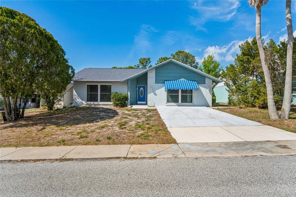 Photo of 4251 Woodfield Avenue, Holiday, FL 34691 (MLS # W7884119)