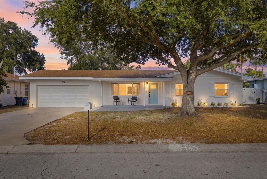Photo of 165 Pinewood Avenue, Clearwater, FL 33765 (MLS # TB8523905)