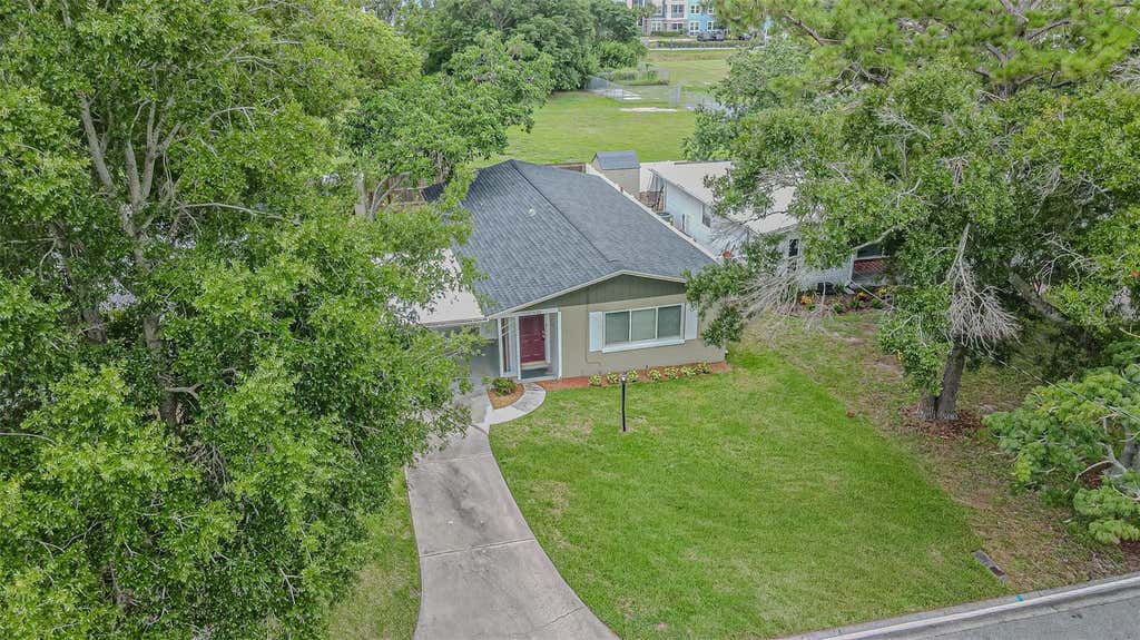 Photo of 925 Cedarwood Avenue, Dunedin, FL 34698 (MLS # TB8533135)