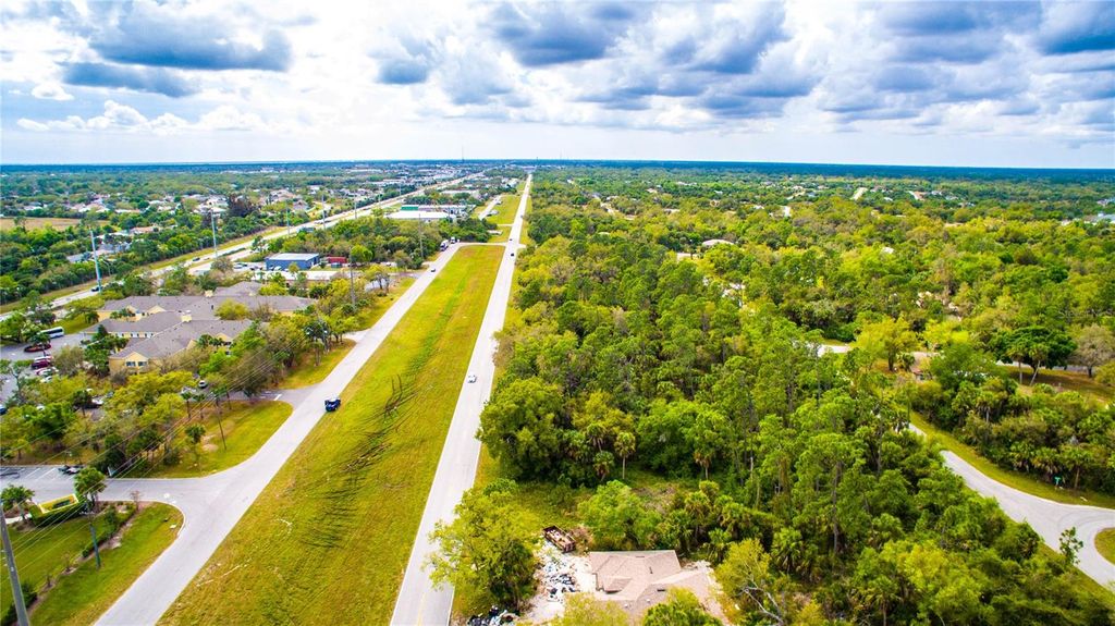 Photo of 20262 Kenilworth Boulevard, Port Charlotte, FL 33954 (MLS # C7489284)