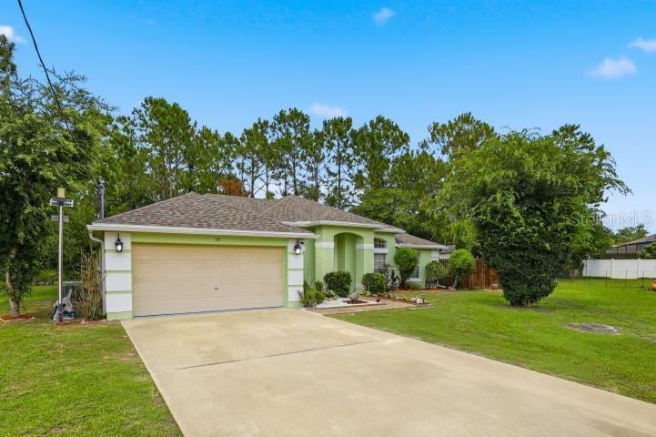Photo of 18 Burton Place, Palm Coast, FL 32137 (MLS # FC319007)