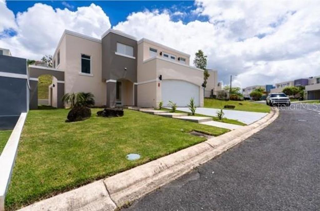 Photo of 114 Sendero Largo Street, Canovanas, PR 00729 (MLS # PR9120707)