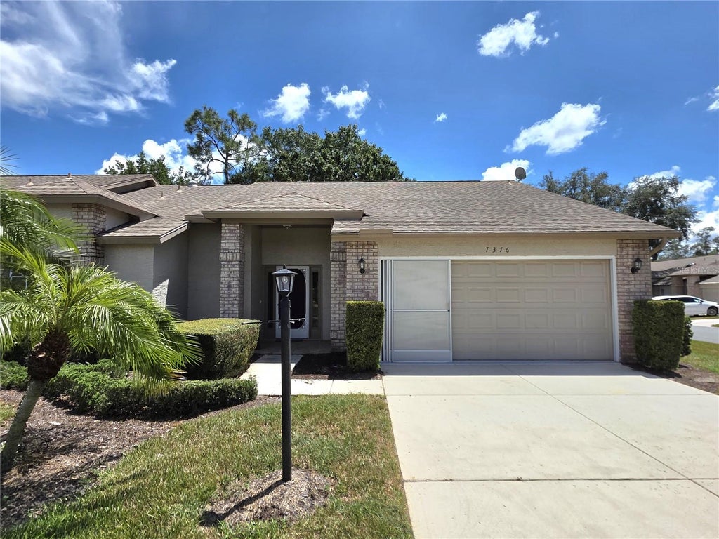 Photo of 7376 Meadow Brook Lane, Spring Hill, FL 34606 (MLS # W7888701)
