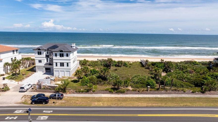 Your Dream Beachfront Homesite Awaits! Save time and money with this exceptional oceanfront property—a rare opportunity to own a slice of Florida’s luxury coastal lifestyle. This purchase includes essential site preparations: property boundary survey, topographic survey, geotechnical/soil report, turtle survey map, and flood zone certificate (Zone V)—all valuable assets to streamline your building process.
Nestled along scenic N Oceanshore Blvd and part of the prestigious Playa del Sur enclave of Hammock Dunes, this large homesite with 100’ of direct oceanfront offers unparalleled beauty and exclusivity. Enjoy private beach access via a dedicated walkover and the protection of high dunes, maintained by the community association. With no required building timeframe, you can secure this prime piece of paradise now and build at your own pace.
Hammock Dunes is a private community, offering an unparalleled lifestyle. Optional memberships at The Club at Hammock Dunes, a Distinguished Emerald Club of the World and Platinum Club of America, grant access to two Audubon-certified golf courses, a swimming pool, fitness center, beachside croquet, tennis, bocce, and pickleball courts. The oceanfront clubhouse features fine dining, a 19th Hole bar, and a stunning balcony overlooking the Atlantic—a perfect way to unwind after a round of golf.
Don’t miss out on this extraordinary opportunity! Call today to schedule a private tour of the homesite and the club (advance notice required for membership tours).