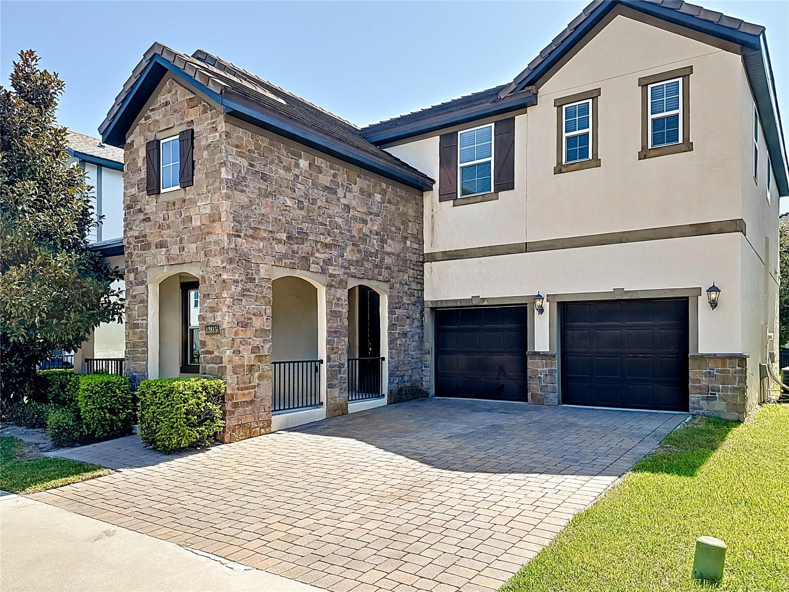 come take look this newly build energy efficient home by Meritage , spacious 3 bedroom 2.5 bath house with office and the den 3 car garage beautiful tile roof with charming front porch for you to have morning coffee , once step in , the private office on your right , and walk in you will see the beautiful kitchen with beautiful counter top and dark wood cabinet ,and the dining room , you won't miss the floor to the ceiling great room bright and luxurious for you to relax and entertain the guest , and also there is cover lanai facing the lake and the walking trail peaceful and quiet , you can also enjoy the view of Disney firework every night walk to upstair you will see the loft for your family , you will see the big master bedroom and the master bathroom feature duel sink and standing shower and the the garden tub , also two more bedroom and another bathroom for you and your guest . The space layout adopts the method of introducing scenery into the room Let the attractive lake scenery superimpose the green of the opposite forest full of vision communiy feature swimming pool and play area the house is located at the heart of windermere and 535 close to all the shopping 5 min walking to the publix and the dinning and bank all around you grade A school for your children .you will definitely not disappoint !